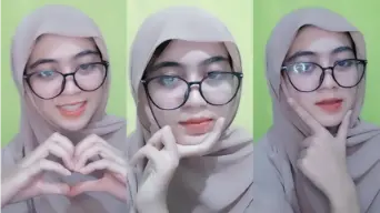 Aichan Host Berjilbab Cantik Ini Menggoda Dengan Mangganya